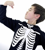 Young Boy in Skeleton Costume
